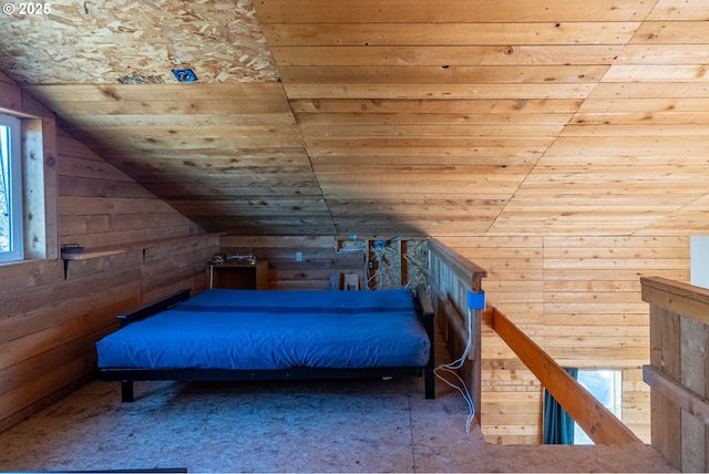 unfurnished bedroom featuring wooden ceiling, vaulted ceiling, and wooden walls