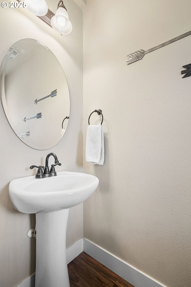 2085 Equestrian Loop S, Salem, OR 97302 - bathroom with baseboards and wood finished floors
