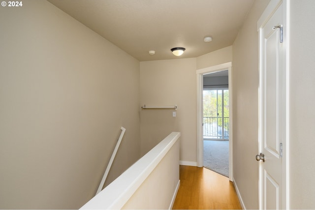 10450 SW Akilean Ter Unit 45, Portland, OR 97223 - corridor with an upstairs landing, light wood-style flooring, and baseboards