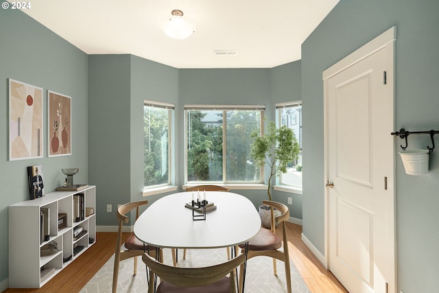 10450 SW Akilean Ter Unit 45, Portland, OR 97223 - dining area featuring light wood-style floors and baseboards