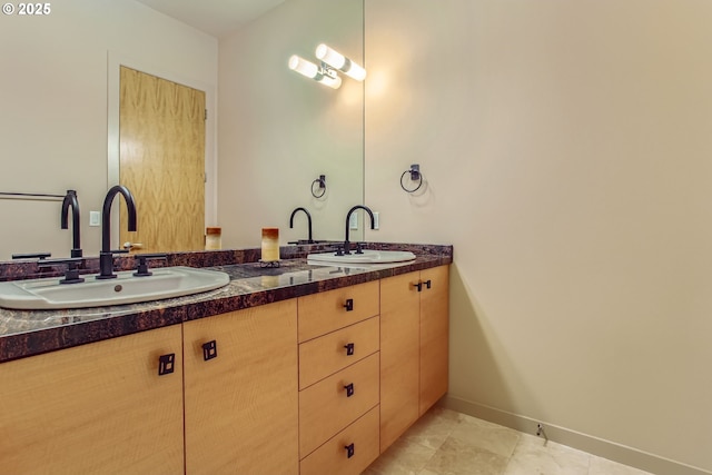 17907 SW Cicero Ct, Beaverton, OR 97007 - bathroom with double vanity and baseboards