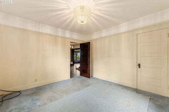 406 8th St, Springfield, OR 97477 - carpeted empty room featuring a chandelier and baseboards