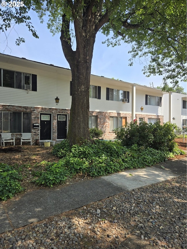 7720 SW Bel Aire Dr, Beaverton, OR 97008 - view of front of property featuring brick siding