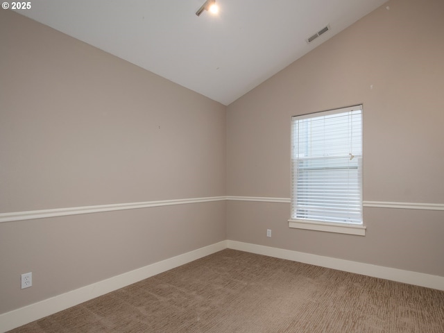15320 SW Jasper Ln, Beaverton, OR 97007 - carpeted spare room with vaulted ceiling and baseboards