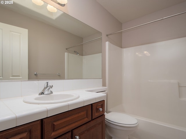 15320 SW Jasper Ln, Beaverton, OR 97007 - bathroom featuring vanity, toilet, and shower / bathtub combination