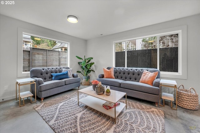 living room featuring concrete floors