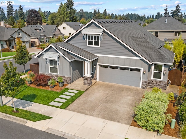 craftsman inspired home featuring a garage