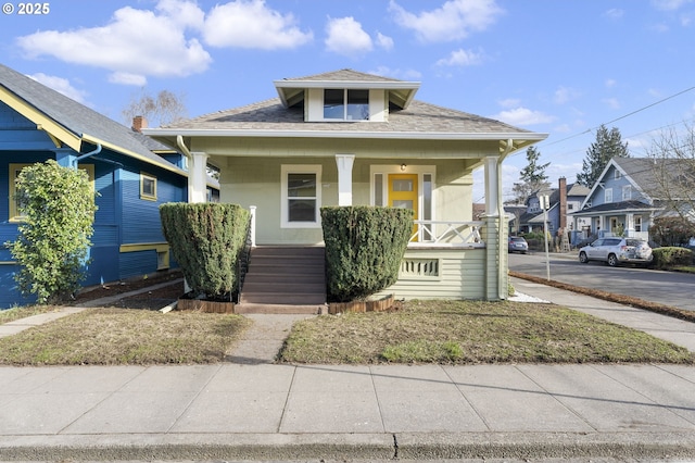 bungalow featuring a porch