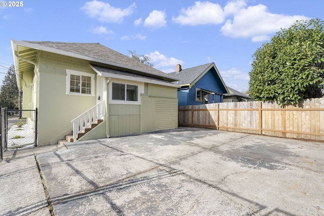 rear view of house with a patio