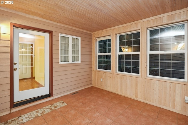 entrance to property with a patio area