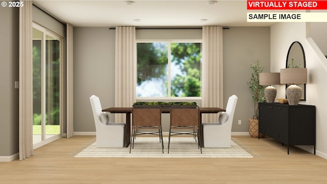 dining room with light hardwood / wood-style floors