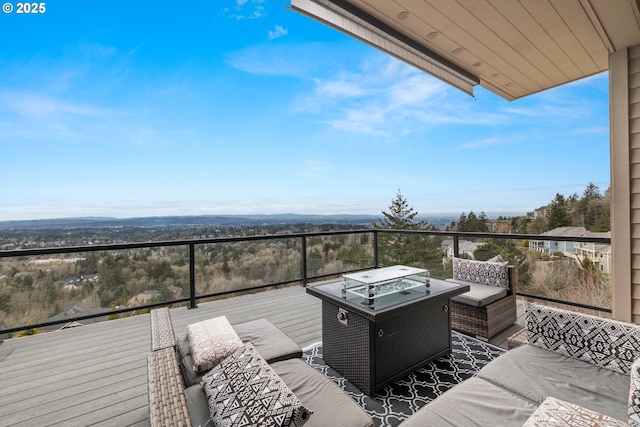 wooden deck featuring an outdoor hangout area