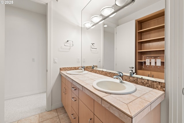 bathroom featuring tile patterned floors and vanity