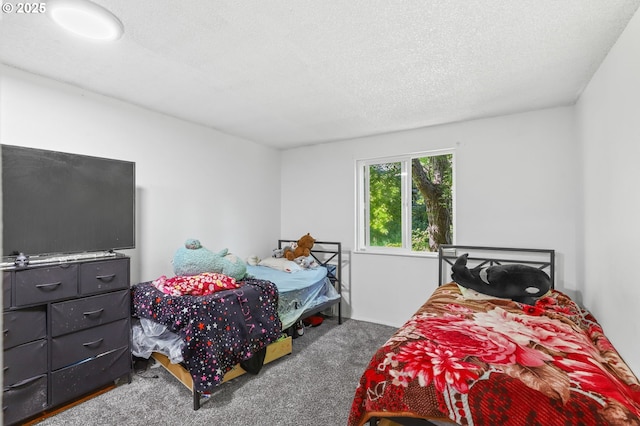 12622 NW Barnes Rd Unit 6, Portland, OR 97229 - carpeted bedroom featuring a textured ceiling