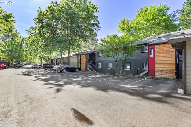 12622 NW Barnes Rd Unit 6, Portland, OR 97229 - uncovered parking lot featuring stairs and entry steps