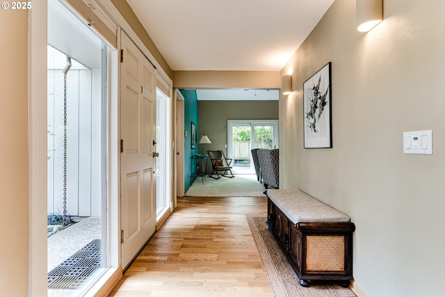 hallway with light wood-type flooring