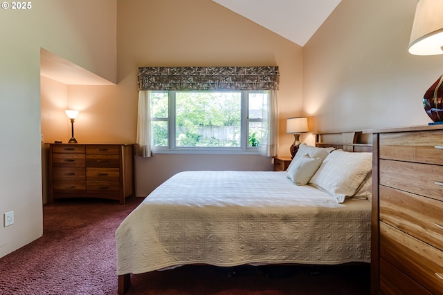 bedroom featuring high vaulted ceiling and carpet flooring