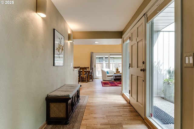 hallway with light wood-type flooring