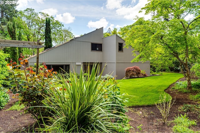 view of home's exterior featuring a yard