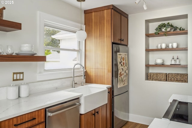 3737 NE 74th Ave, Portland, OR 97213 - kitchen with appliances with stainless steel finishes, open shelves, a sink, and brown cabinets