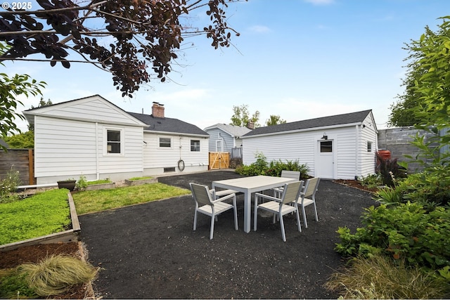 3737 NE 74th Ave, Portland, OR 97213 - view of patio with outdoor dining area and an outdoor structure