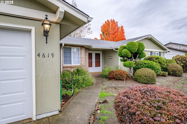 property entrance with a garage