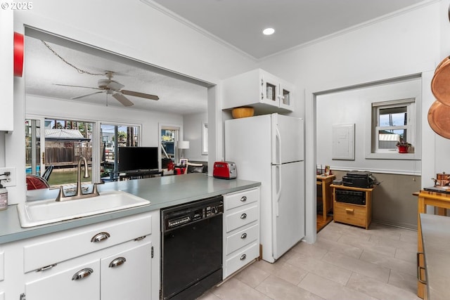 kitchen featuring white cabinets, crown molding, sink, dishwasher, and white fridge