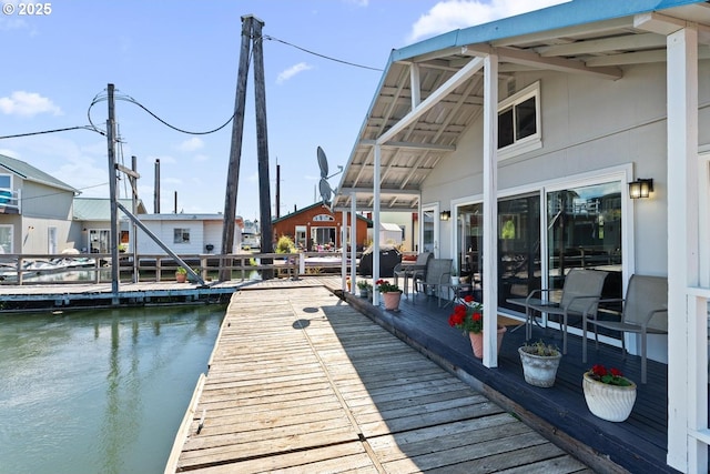 view of dock with a water view