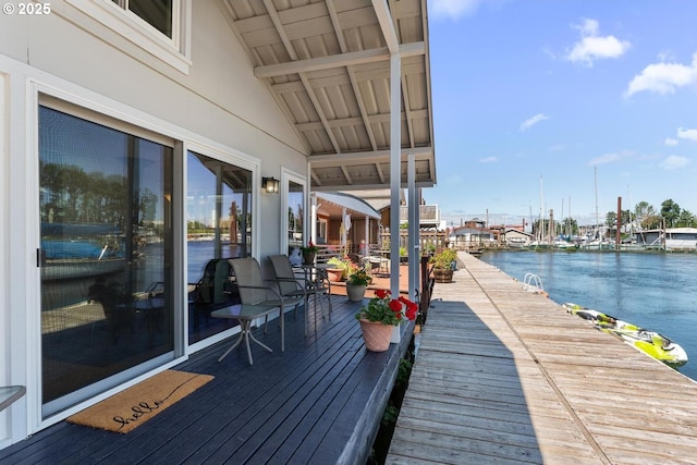 wooden terrace with a water view