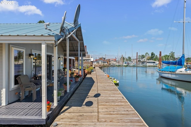 view of dock with a water view