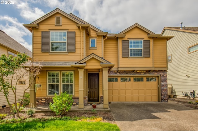 10380 SW Madrid Loop, Wilsonville, OR 97070 - view of front facade with brick siding, concrete driveway, and an attached garage