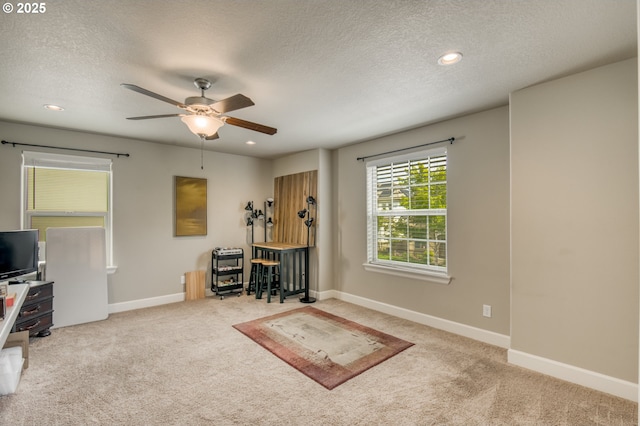 10380 SW Madrid Loop, Wilsonville, OR 97070 - home office with ceiling fan, carpet, a textured ceiling, and recessed lighting
