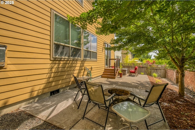 10380 SW Madrid Loop, Wilsonville, OR 97070 - fenced backyard featuring an outdoor fire pit and a patio