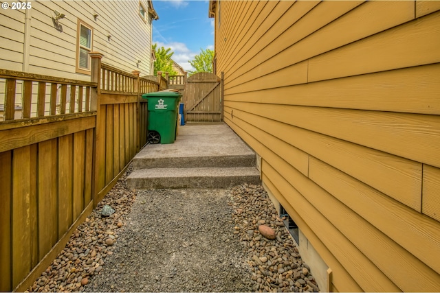 10380 SW Madrid Loop, Wilsonville, OR 97070 - view of side of home with a gate