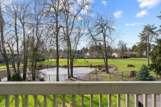 view of water feature with fence