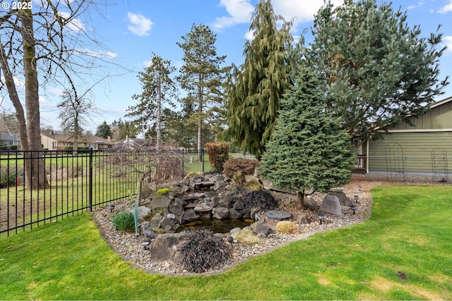 view of yard featuring fence