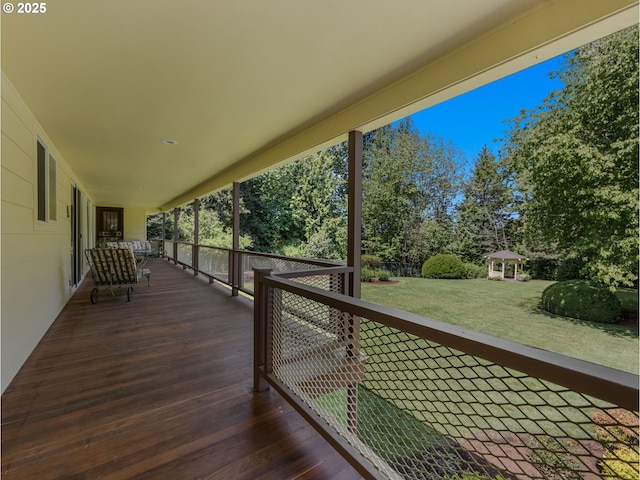 wooden deck with a yard