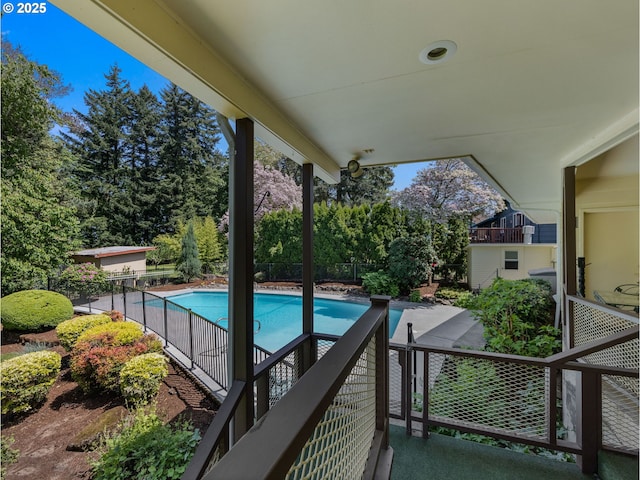 exterior space featuring a fenced in pool and fence