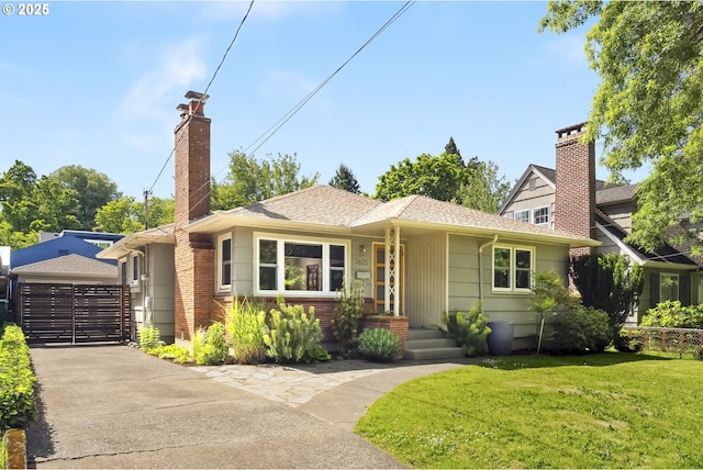 7625 N Fowler Ave, Portland, OR 97217 - view of front of home with a chimney, roof with shingles, and a garage