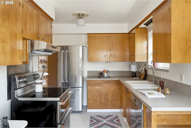 7625 N Fowler Ave, Portland, OR 97217 - kitchen with appliances with stainless steel finishes, a sink, extractor fan, and light countertops