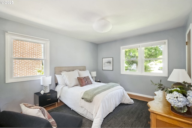 7625 N Fowler Ave, Portland, OR 97217 - bedroom featuring dark wood-style floors and baseboards
