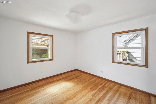 7625 N Fowler Ave, Portland, OR 97217 - unfurnished room featuring healthy amount of natural light and baseboards
