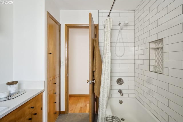 7625 N Fowler Ave, Portland, OR 97217 - full bathroom featuring shower / bathtub combination with curtain, tile patterned floors, and vanity