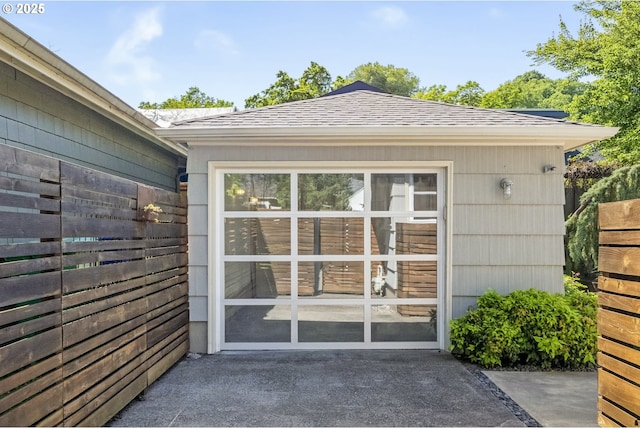 7625 N Fowler Ave, Portland, OR 97217 - doorway to property featuring roof with shingles
