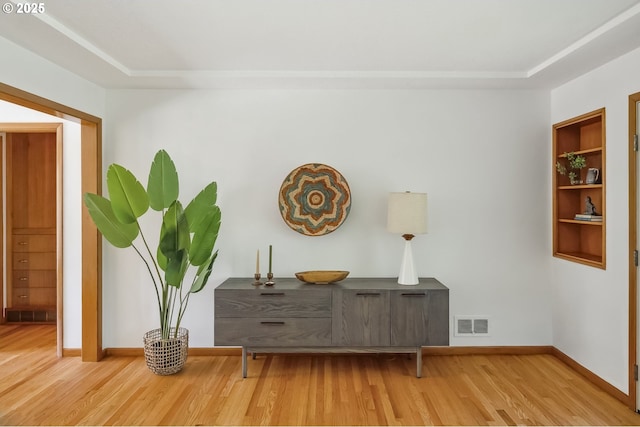 7625 N Fowler Ave, Portland, OR 97217 - detailed view of wood finished floors, baseboards, and a raised ceiling