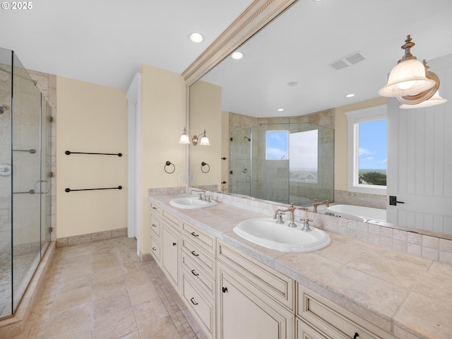 88902 Pinehurst Rd, Gearhart, OR 97138 - bathroom featuring a stall shower, a garden tub, double vanity, recessed lighting, and baseboards