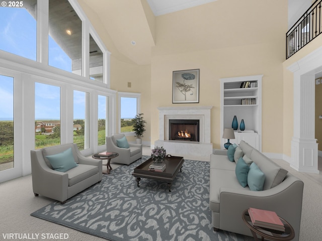 88902 Pinehurst Rd, Gearhart, OR 97138 - carpeted living room with a high ceiling, a premium fireplace, and healthy amount of natural light