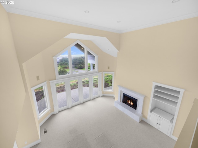 88902 Pinehurst Rd, Gearhart, OR 97138 - unfurnished living room featuring carpet flooring, a warm lit fireplace, a towering ceiling, ornamental molding, and baseboards