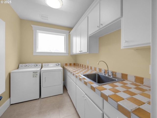 88902 Pinehurst Rd, Gearhart, OR 97138 - washroom with separate washer and dryer and cabinet space