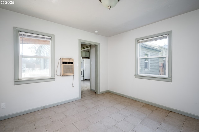 spare room featuring a wall mounted AC